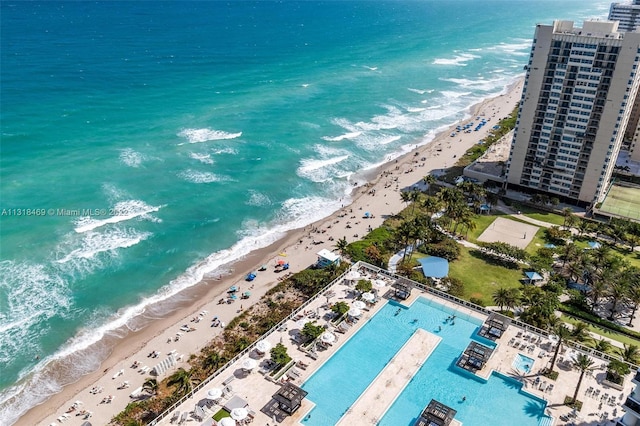 bird's eye view with a view of the beach and a water view