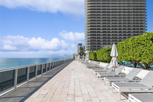 view of patio featuring a water view