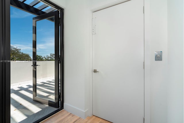 doorway featuring light hardwood / wood-style flooring