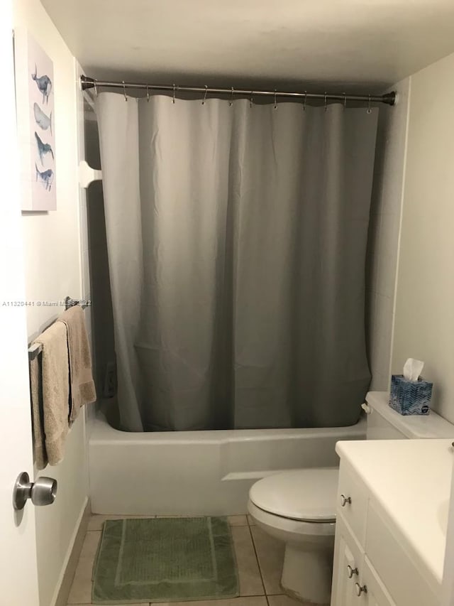 full bathroom featuring toilet, tile flooring, shower / bathtub combination with curtain, and vanity