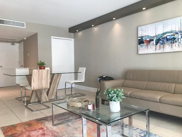 living room with light tile flooring