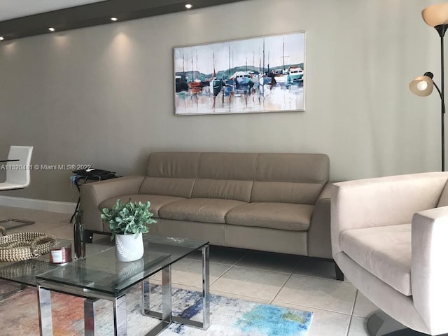 living room featuring light tile floors