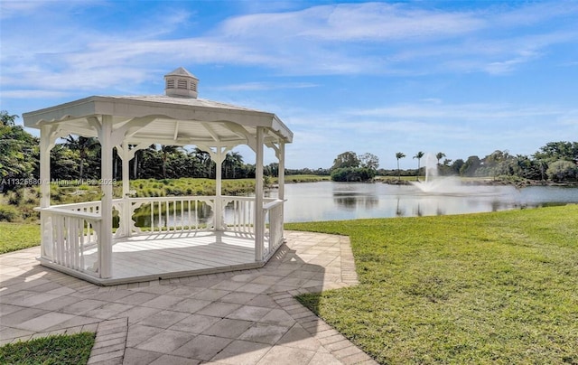 exterior space with a water view, a gazebo, and a yard