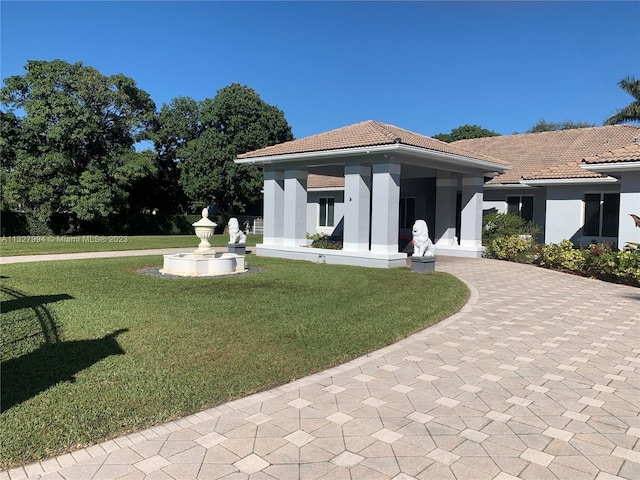 view of front of home with a front yard