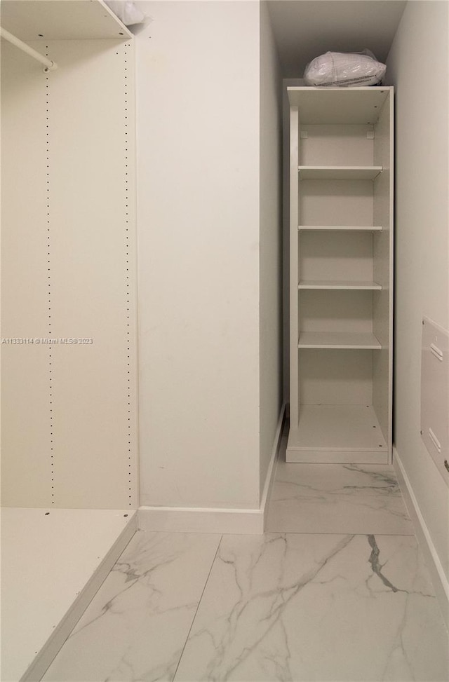 16385 Biscayne Blvd Unit 2016, North Miami Beach, FL 33160 - walk in closet with light tile floors