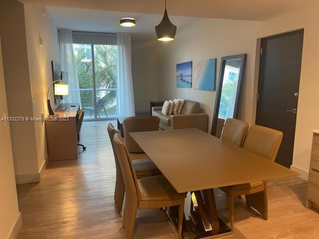 dining room with light hardwood / wood-style flooring