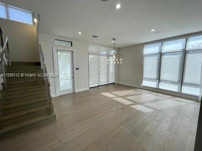 empty room with light wood-type flooring