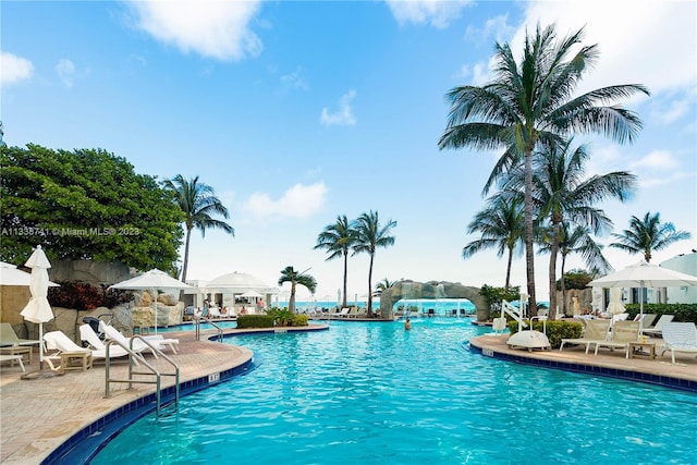 view of swimming pool with a patio area