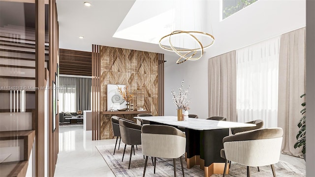 dining space featuring an inviting chandelier and light tile floors