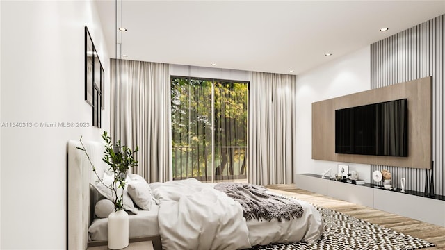 bedroom featuring hardwood / wood-style flooring