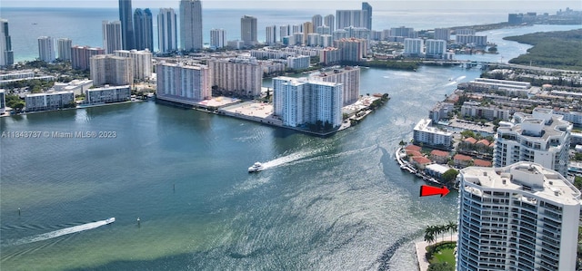 birds eye view of property featuring a water view