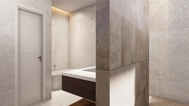 bathroom featuring tile walls and vanity