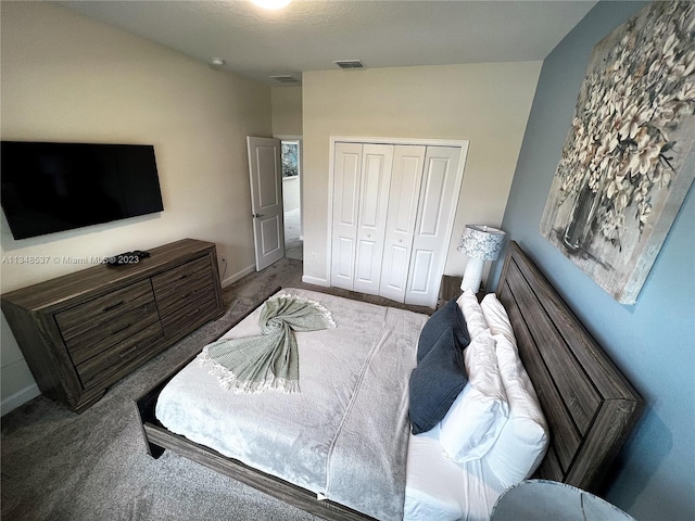 bedroom with a closet, carpet flooring, and lofted ceiling