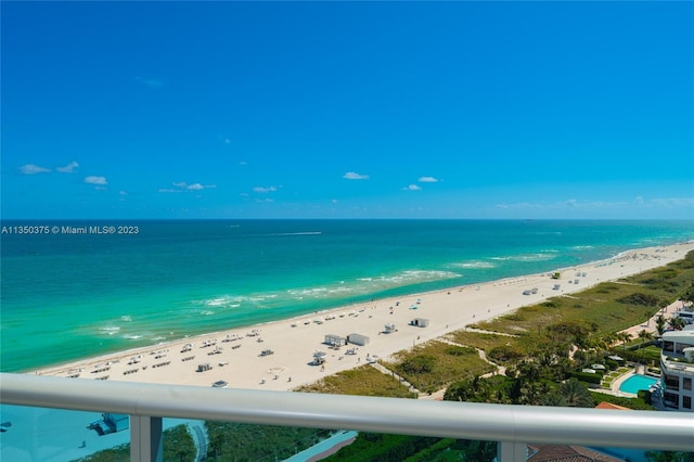 property view of water featuring a beach view