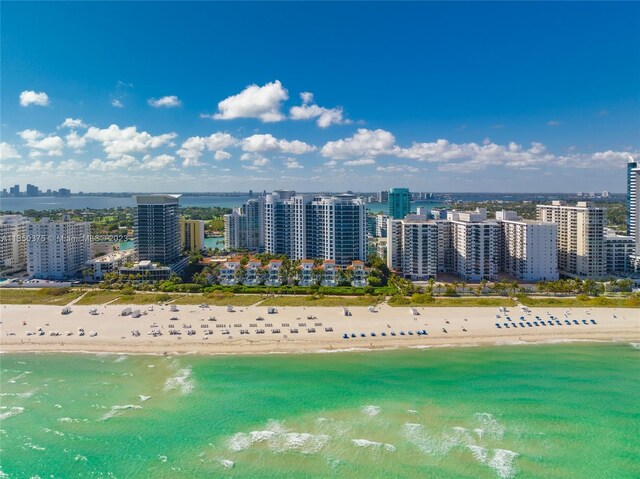 aerial view featuring a beach view and a water view