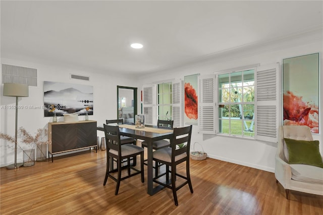 dining room with light hardwood / wood-style floors