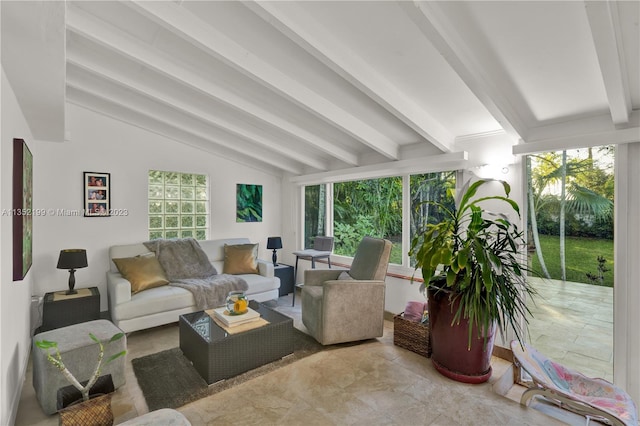 living room with light tile flooring and lofted ceiling with beams