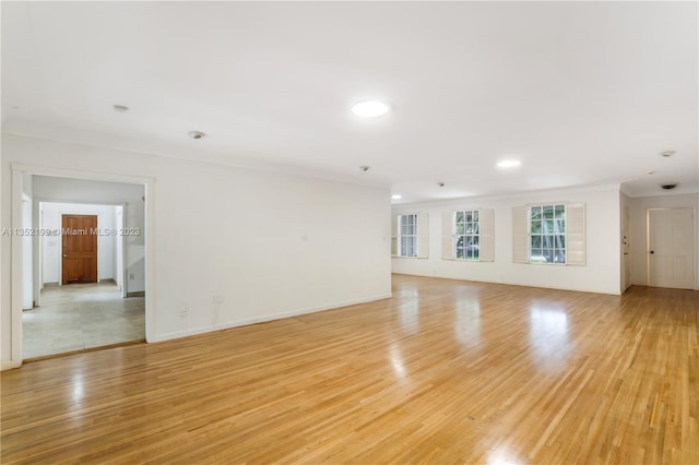 unfurnished living room with light hardwood / wood-style floors