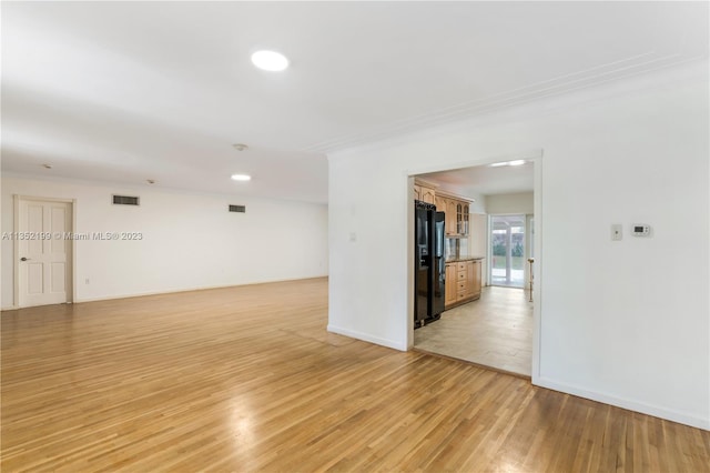 empty room with light wood-type flooring