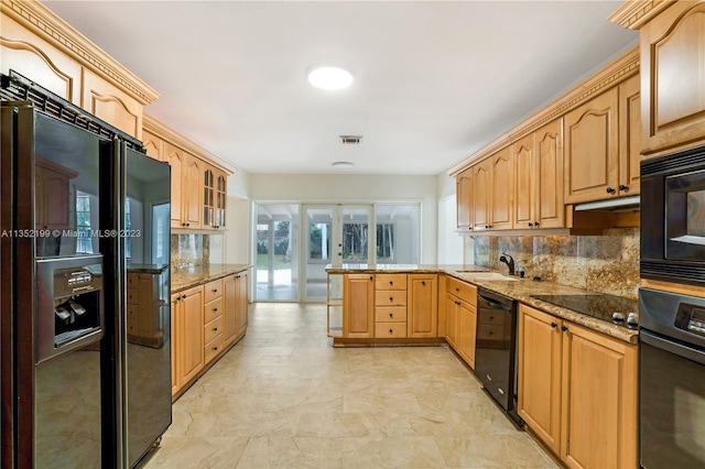 kitchen featuring black appliances, sink, dark stone countertops, light tile floors, and tasteful backsplash