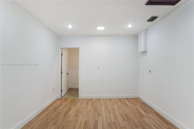 unfurnished room featuring light wood-type flooring