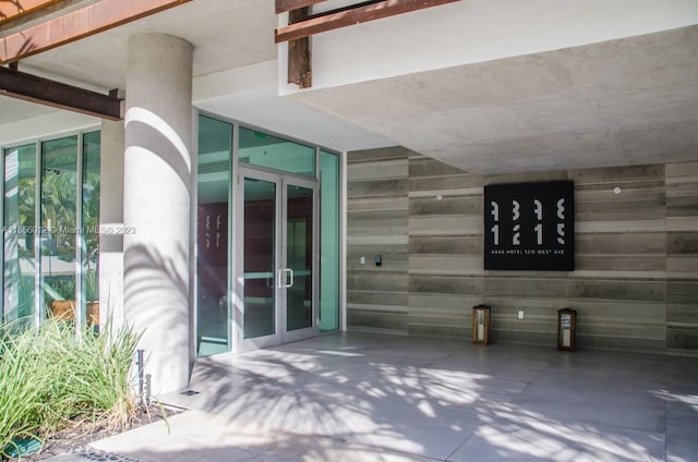 entrance to property featuring french doors