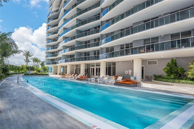 view of swimming pool with a patio area