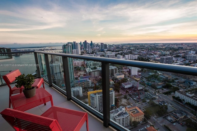 view of balcony at dusk