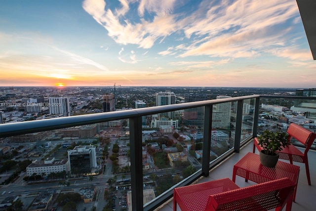 view of balcony at dusk