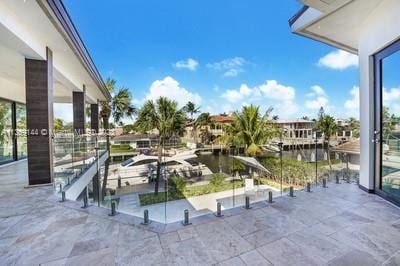 view of patio / terrace with a water view