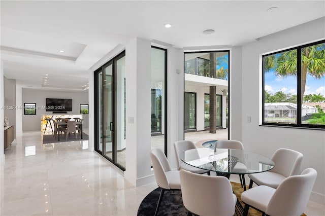 dining room featuring a wall unit AC