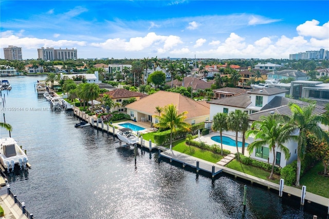 birds eye view of property featuring a water view