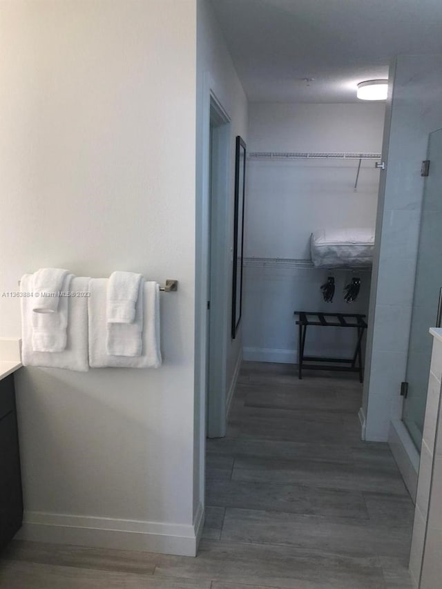 bathroom featuring vanity and hardwood / wood-style flooring