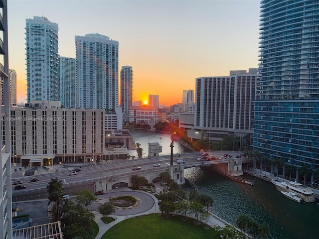 property's view of city featuring a water view