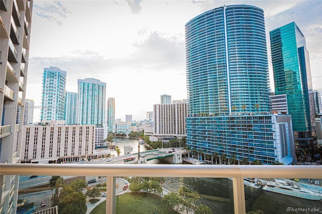 property's view of city featuring a water view