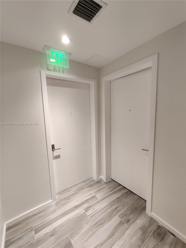 hall featuring light wood-type flooring