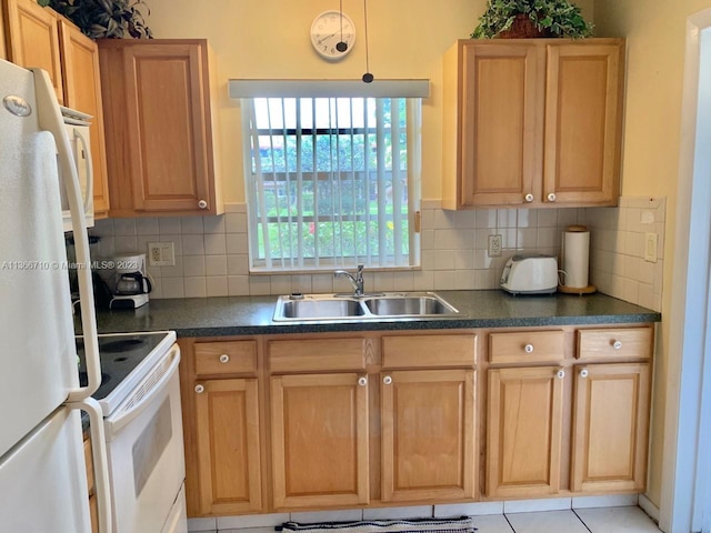 kitchen with tasteful backsplash, white appliances, sink, and light tile floors