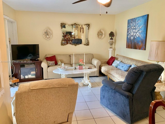 living room with light tile floors and ceiling fan