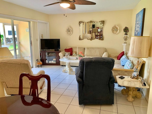 living room featuring light tile flooring and ceiling fan