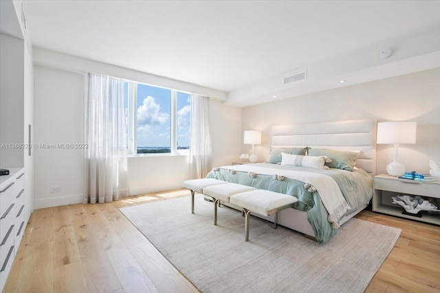 bedroom with light wood-type flooring