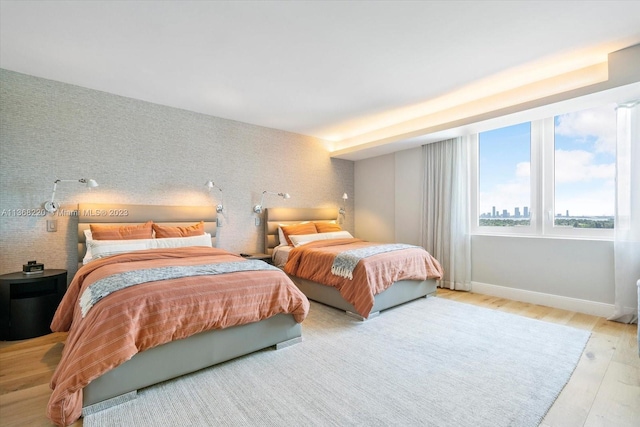 bedroom featuring light wood-type flooring