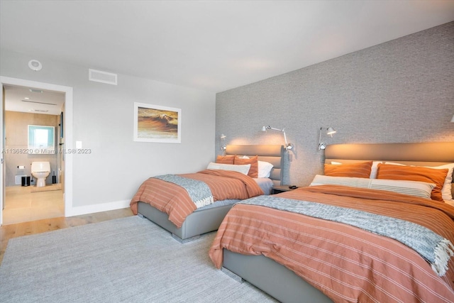 bedroom featuring light hardwood / wood-style flooring