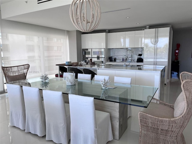 dining room with a chandelier