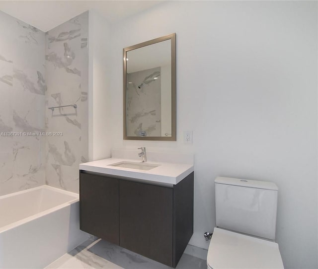 full bathroom featuring toilet, vanity, and tiled shower / bath