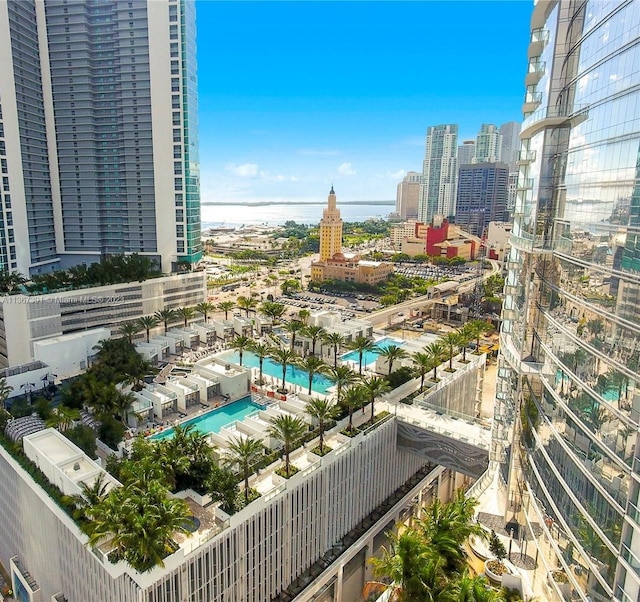 balcony featuring a community pool