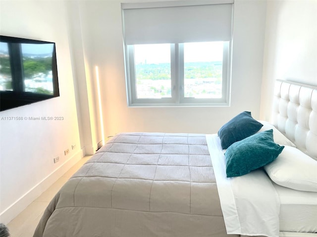 bedroom with light hardwood / wood-style flooring