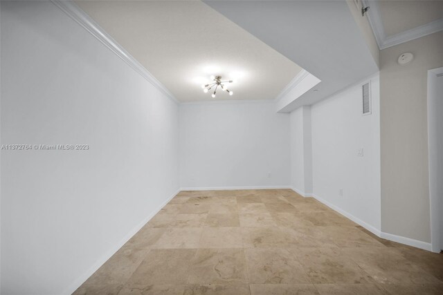 tiled empty room with ornamental molding