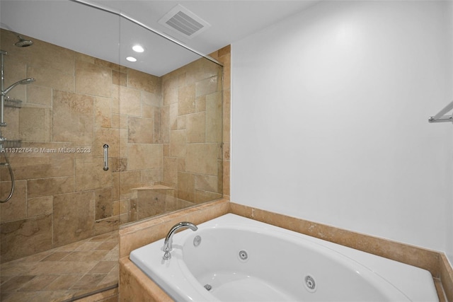 bathroom with independent shower and bath