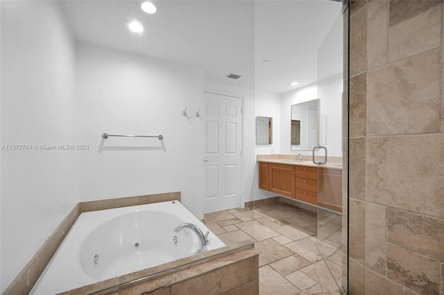 bathroom featuring tile floors and large vanity