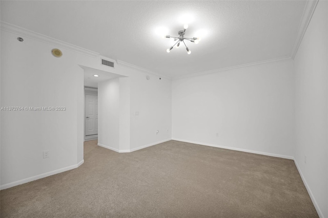 carpeted spare room with ornamental molding